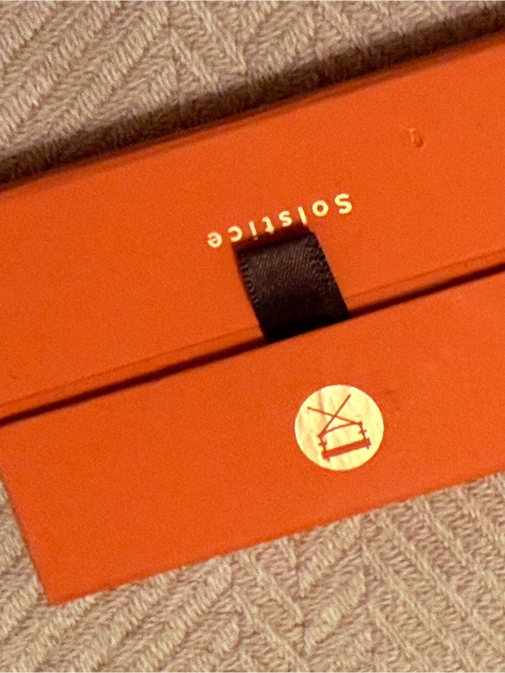 Solstice Orange Gift Box with Black Pull Ribbon and Gold Seal